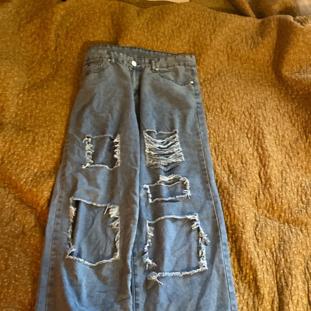 Ripped jeans. JEANS. XL. Faded blue.